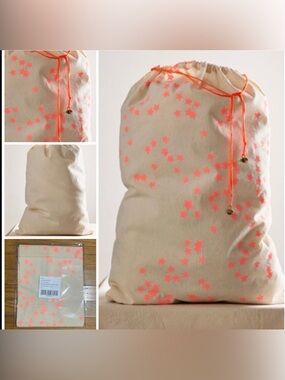 Free People large reusable holiday gift bag tote with drawstring cords